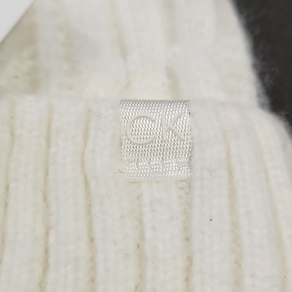 NWT Calvin Klein Cream Faux Fur Pom-Pom Knit Beanie Hat One Size MSRP $48 - Picture 4 of 10